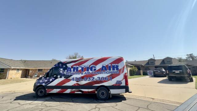 The Artic Air van parked out front customer's home.